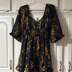 Indulge Black and Gold Floral Mini Dress
